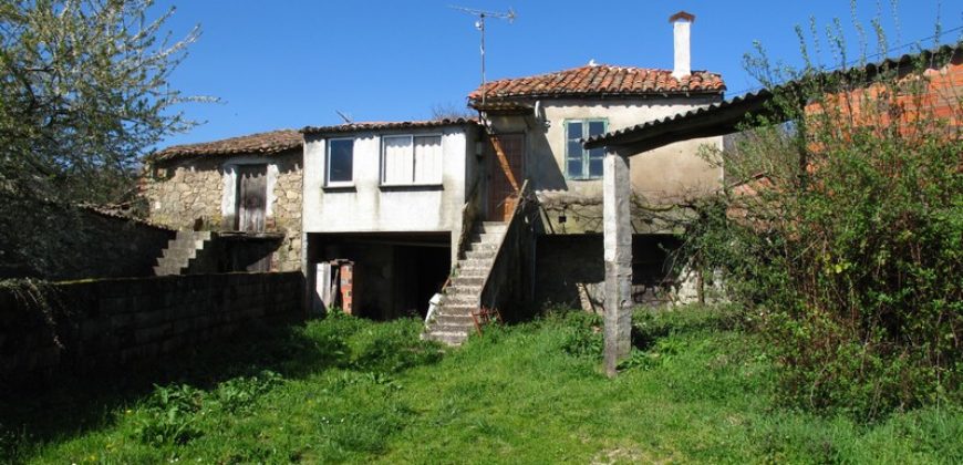 Partially stone-built house in need of refurbishment with garden and barn