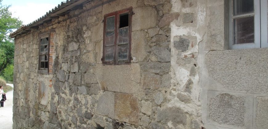 Traditional stone house with covered courtyard and good sized plot of land