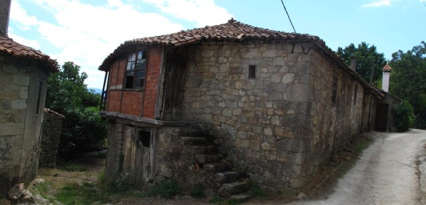 Traditional stone house with covered courtyard and good sized plot of land