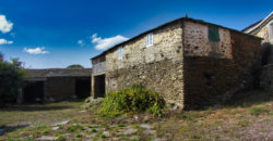 Large stone house with courtyard, outbuildings and land