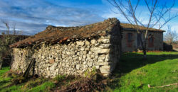 Rustic stone-built house to renovate with outbuildings and land
