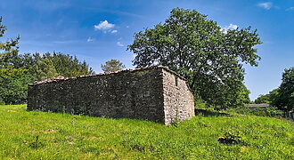 Fully enclosed plot of land with a stone-built cottage to restore