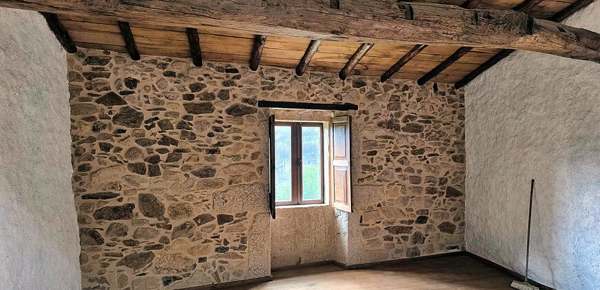 Tastefully renovated stone house with outbuildings and garden near the river Cabe