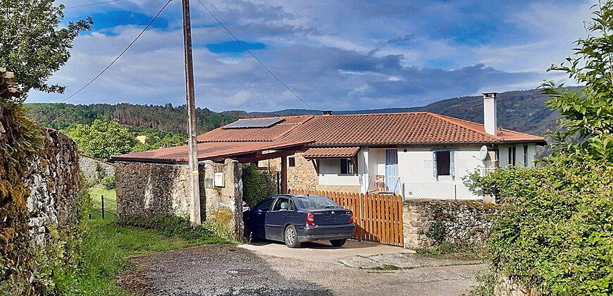 Tastefully renovated stone house with outbuildings and garden near the river Cabe