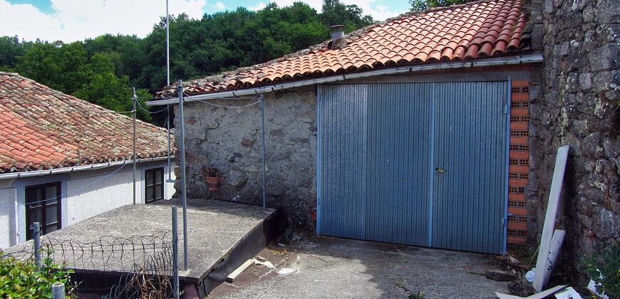 Partially renovated stone house with land in an attractive location